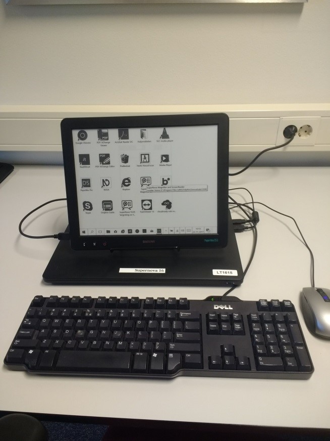 Laptop met e-ink scherm met iconen in
beeld