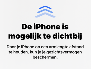 Schermafbeelding van Schermafstand: tekst "De iPhone is mogelijk te
dichtbij"