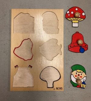Houten puzzel met omlijnde
contouren